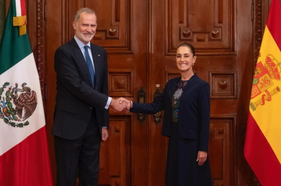 Claudia con el rey de españa